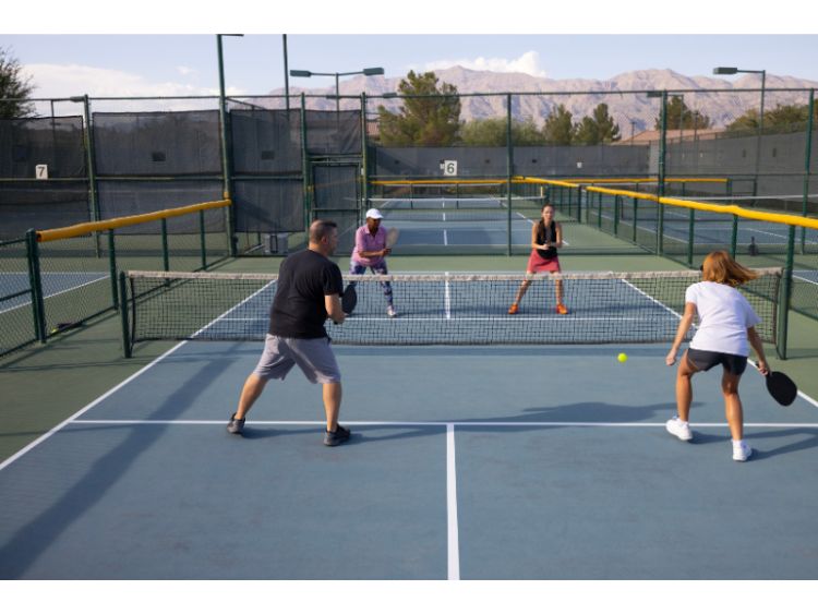 People playing pickleball.