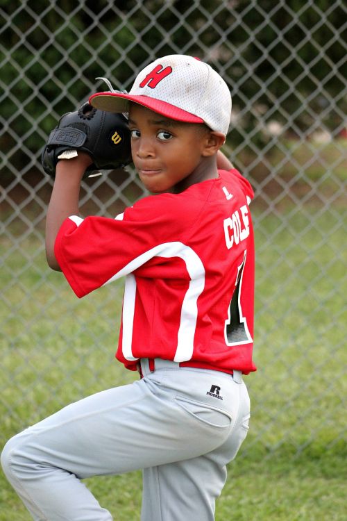Boy in baseball uniform