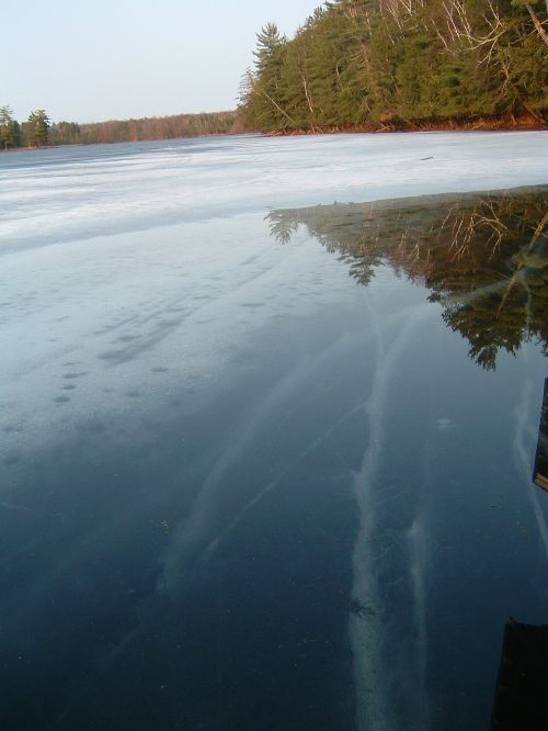 Lack of snow cover exposes lake ice to solar radiation causing expansion and cracking. Photo credit: Jane Herbert