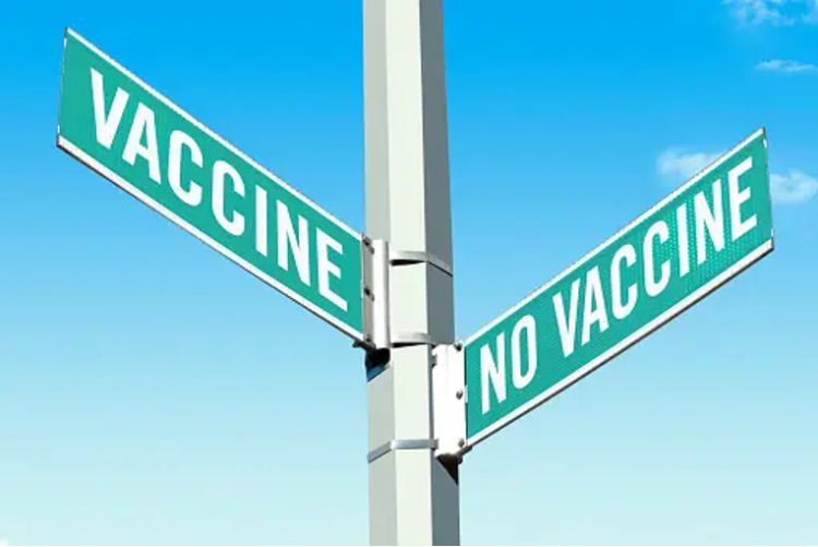 A street sign with one cross street saying vaccine and the other saying no vaccine.