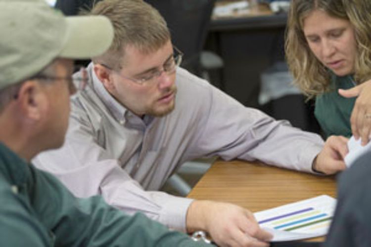 Nicholak T. Bancroft (middle) pictured with MSU AgBioResearch's Karen Renner (far right)