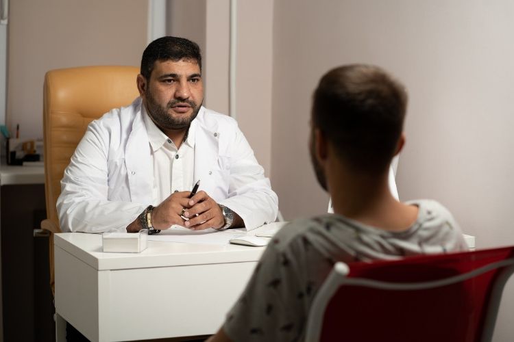 A doctor talks to a patient.