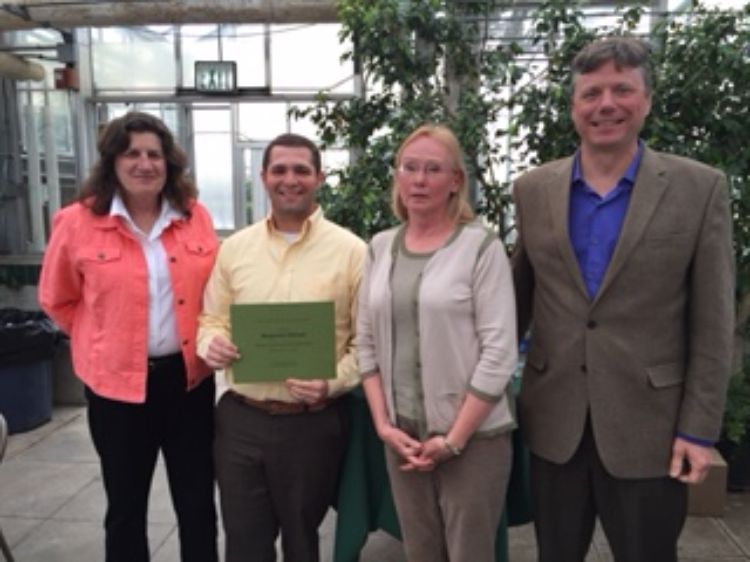 Benjamin Schram, center left, is awarded the McDonough Scholarship.