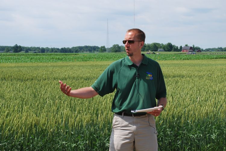 Kurt Steinke, a soil fertility and nutrient management expert, presents at a previous field day.