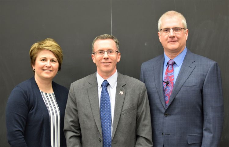 CANR Senior Associate Dean Kelly Millenbah and CANR Dean Ron Hendrick present the Camden Endowed Teacher/Scholar Award to Kirk Dolan (center) from the departments of Food Science and Human Nutrition and Biosystems and Agricultural Engineering.