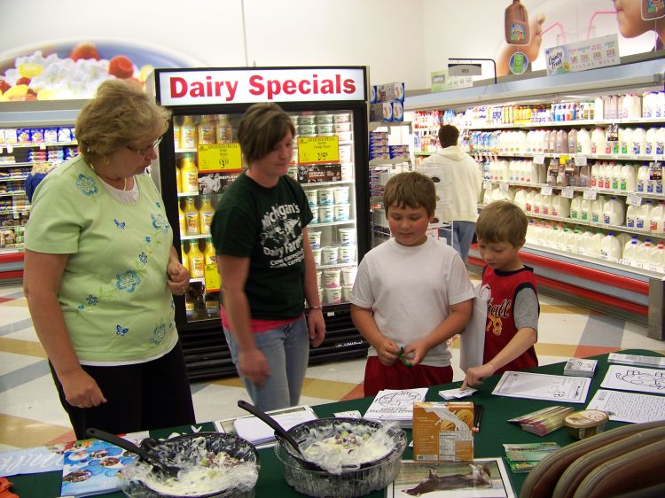 Volunteers from local dairy farms and 4-H groups passed out recipes and answered questions about dairy products and dairy farming at several grocery stores throughout Michigan.