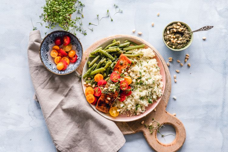 Bowls of vegetables and seeds.