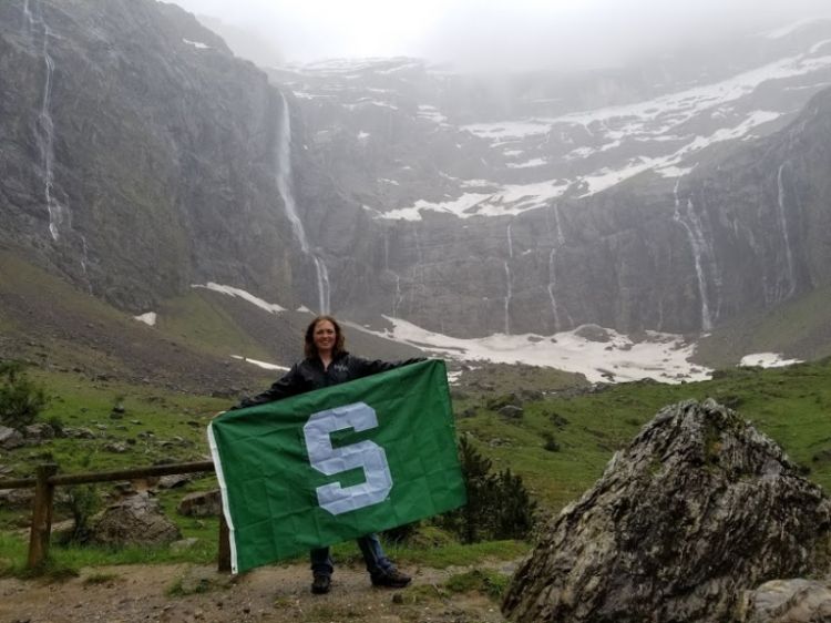 Emily with MSU flag.