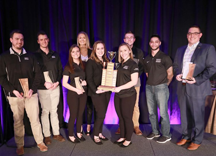 Image of students and faculty with the 1st place award.