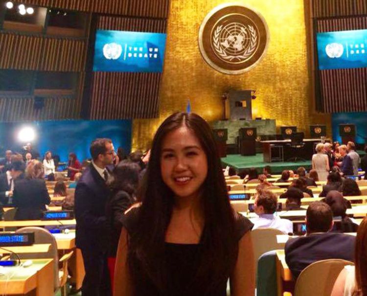 Kayla Zhu in the General Assembly Hall at the UN debate for the election of the next UN Secretary-General.