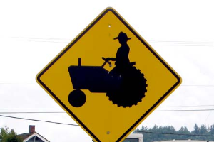Safely moving farm equipment on public roads can be a challenge