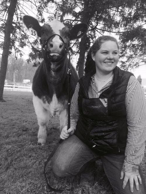 Bailey Welshans poses with her steer, Joey. Photo by Shelby Welshans.