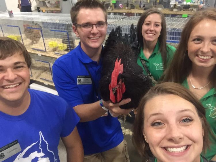 Tom led fellow State Youth Leadership Council members on a tour of the state fairgrounds, including a stop with his rooster Fred. Left to right: Loren King, Tom Purves, Samantha Beaudrie, Emily Kittendorf and SYLC co-facilitator Makena Schultz.