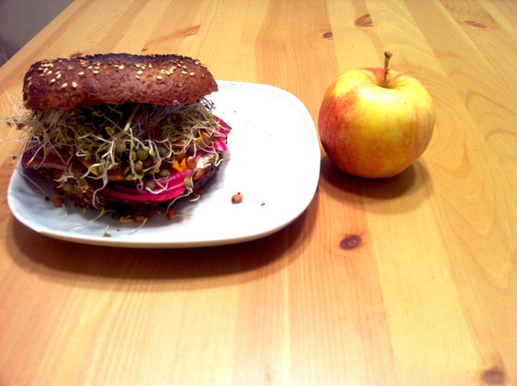 Julia’s lunch: A sprouted wheat bagel with roasted root vegetables, cream cheese and sprouts. 