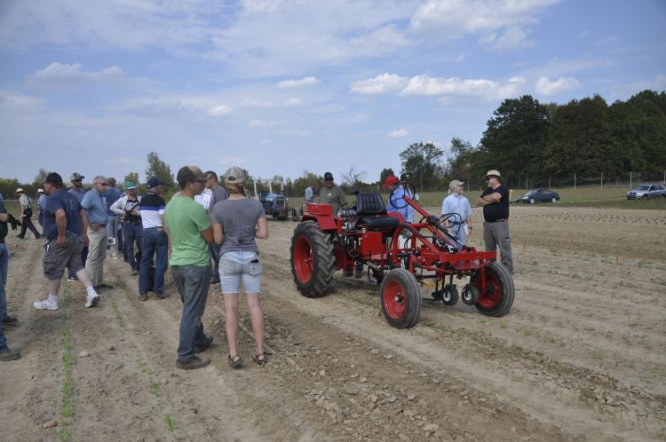 People inspecting machine