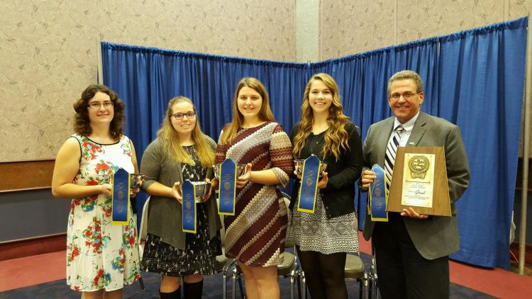 The 2015 NAILE Michigan 4-H Dairy Judging Team, from left: Allison Schafer, Skylar Buell, Cameron Cook, Madeline Meyer and Dr. Joe Domecq. Photo credit: Jessica Jakubik | MSU Extension