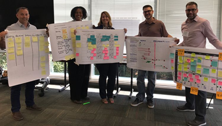 Training participants showing the results of their group work during an NCI charrette training in Raleigh, North Carolina.
