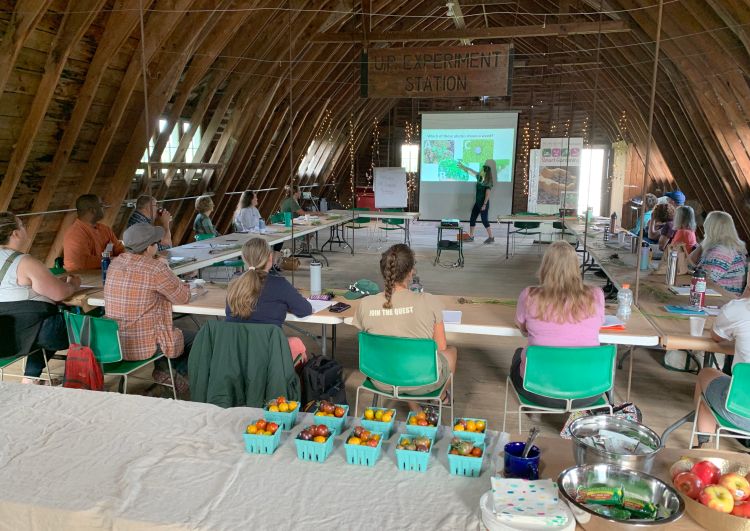 Erin Hill presents to people in a classroom.