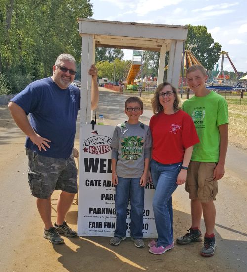 Jennifer Weichel and her family volunteering at the Genesee County Fair. Left to right: Larry, Jack, Jennifer and Andrew Weichel. Photo by Ken Turland.