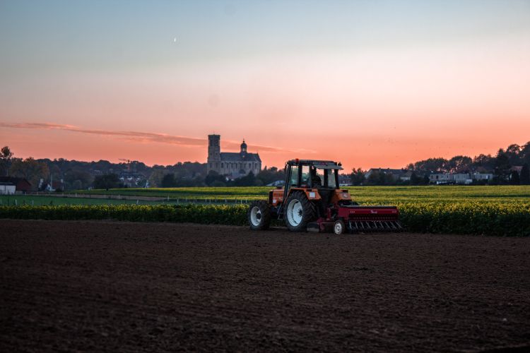 A tractor in a farm.