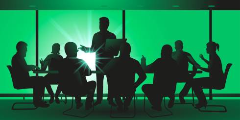 people meeting in a room green background