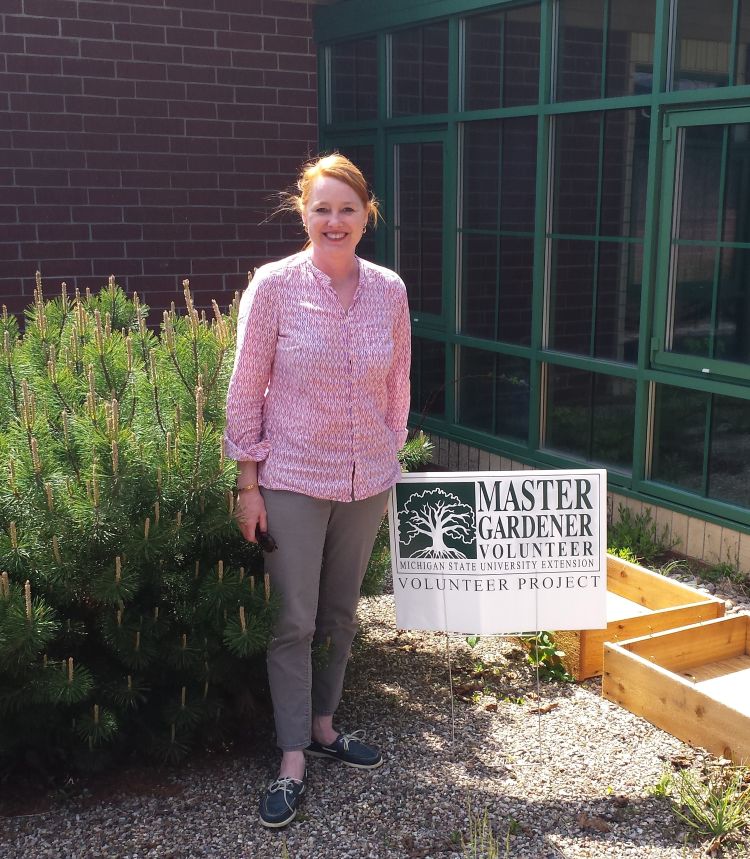 Elizabeth at the start of Woodland Summer School Childcare garden. Photo credit: Emily Slajus