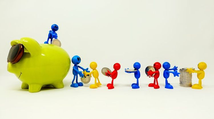 Family with piggy bank