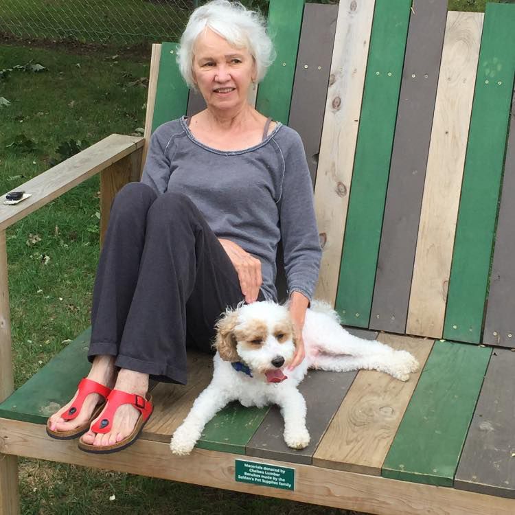 Photo of April Allen, assistant professor of interior design, with her dog.