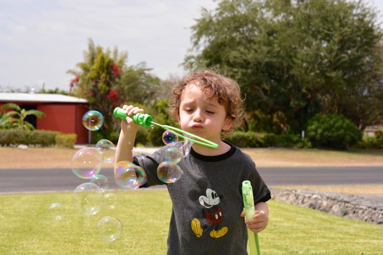 Try some of these suggestions for using bubbles to enhance learning in different developmental areas! Photo credit: Pixabay.