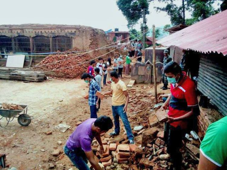 4-H Nepal volunteers managing the debris after the April 25, 2015, earthquake. All images courtesy of Lok Raj Awasthi.