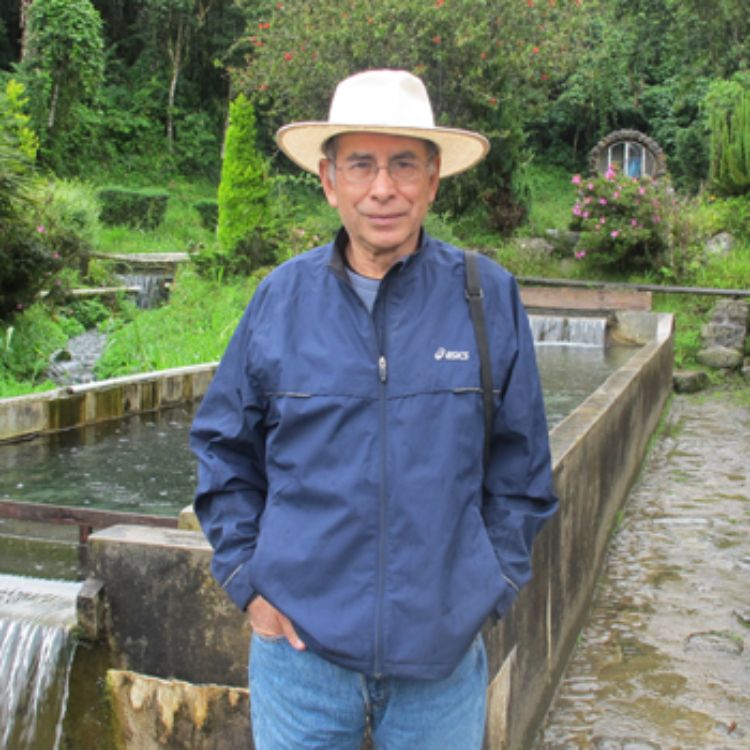 Photo of Professor Emeritus Rene Hinojosa at fish ponds in Bolivia.