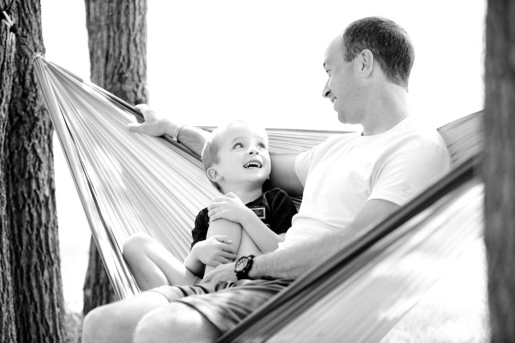 Father and son in a hammock