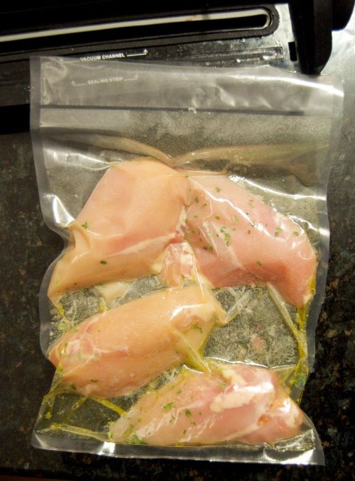 Chicken breasts in a vacuum package.