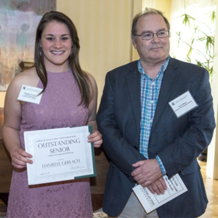 MSU alumna Danielle Gerlach with Professor Mark Wilson, URP Program Leader, at the College of Social Science Achievement Gala.