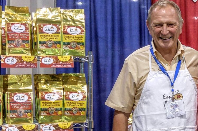 Tony Menyhart of Easy Artisan Bread Mix, LLC at a food exhibit. Photo credit: Tony Menyhart
