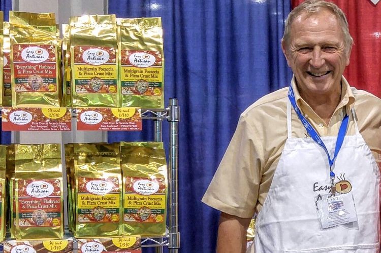 Tony Menyhart of Easy Artisan Bread Mix, LLC at a food exhibit. Photo credit: Tony Menyhart