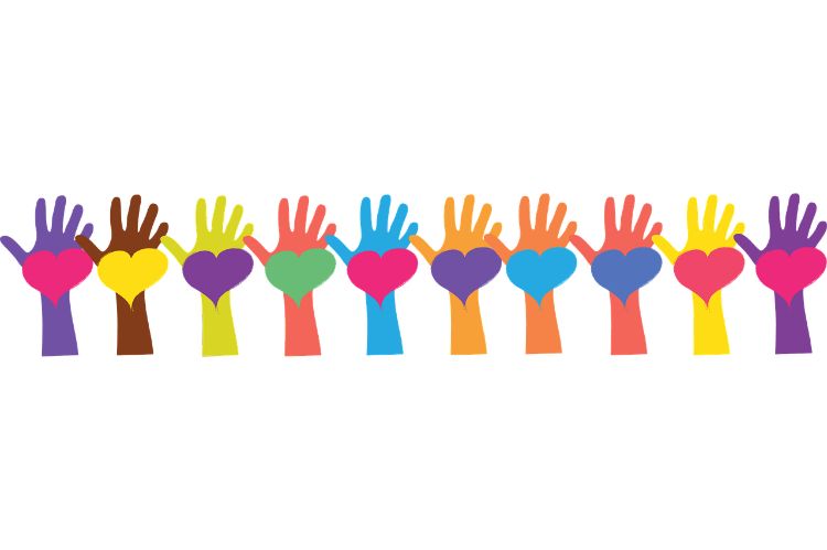 Different colored hands with hearts on the palm.