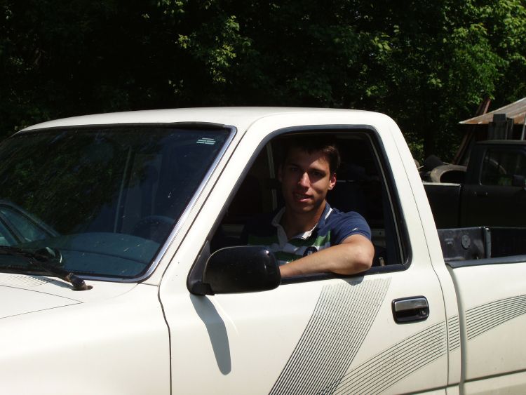 A person driving a truck