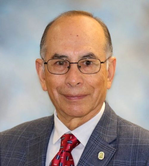 Headshot of René C. Hinojosa, Interim School Director