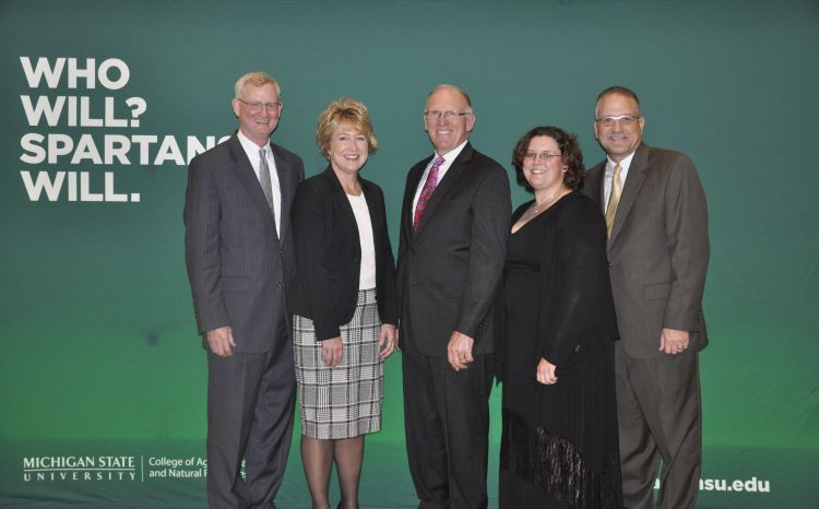 From left to right, MSU Extension director Jeff Dwyer, Sheila Burkhardt, President Ken Nobis of the Michigan Milk Producers Association and Melissa Elischer and Patrick Cudney of MSU Extension.