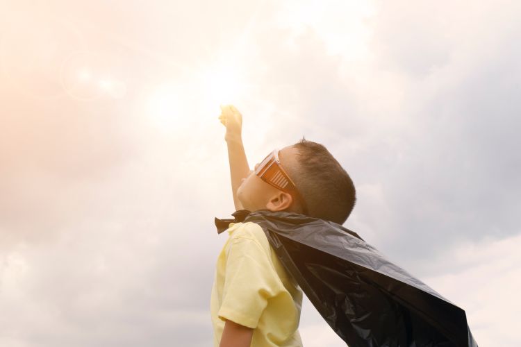 Boy in superhero costume