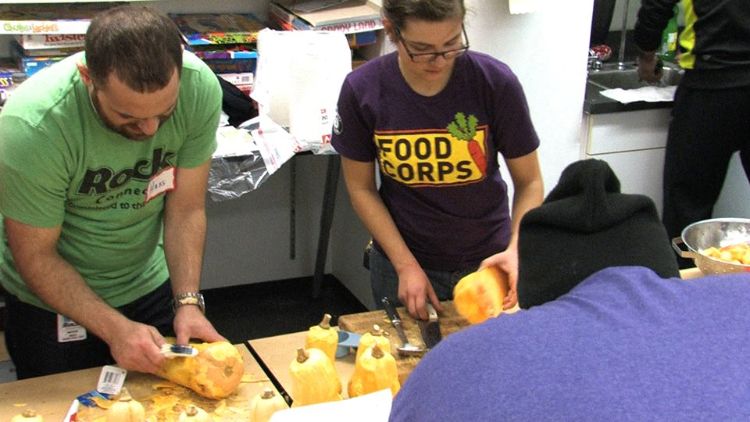 FoodCorps service members assist with getting institutions to purchase more local produce.