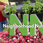 Farmers' market radishes and basil plants. Two capital Ns overlayed by 