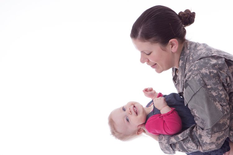 Military mom holding baby