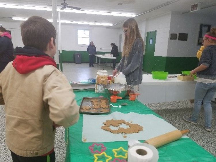 4-H members making dog treats.