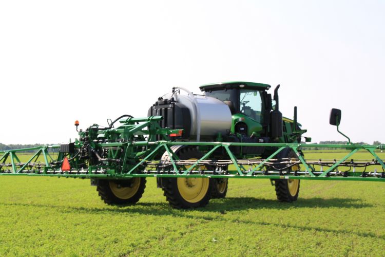 A sprayer in a field.