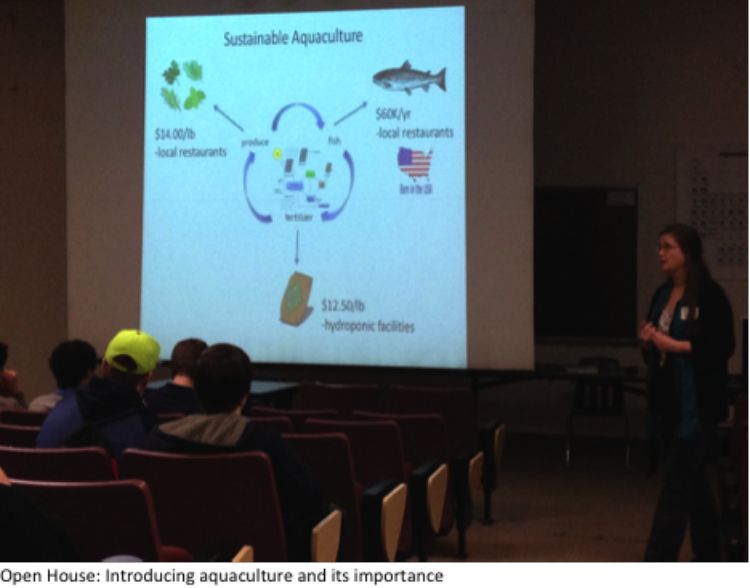 Lake Superior State University Professor Dr. Barbara Evans describes to high school students a model of sustainable aquaculture. Photo: Kacie Ferguson