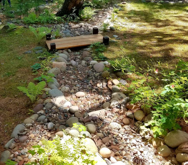 Riverway filled with rocks used for managing stormwater.