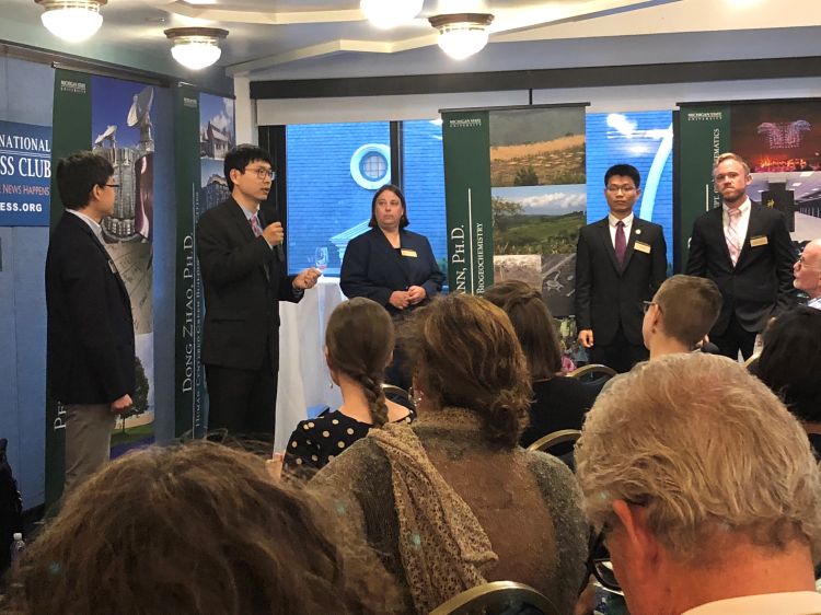 Photo of Dong Zhao presenting his research at the National Press Club in Washington, DC.