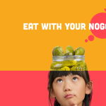 Asian girl with jar of pickles as the top of her head
